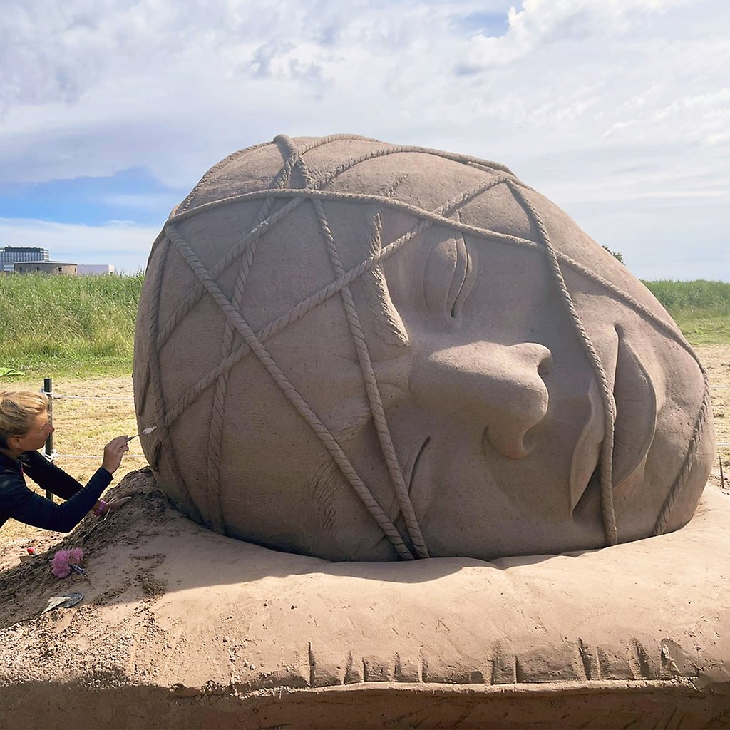 Sandskulpturen Felt asleep